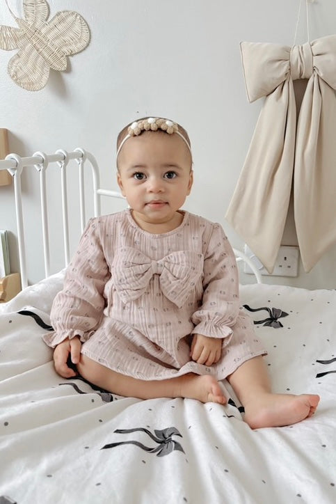 DELICATE BABY GIRL DRESS WITH BOW ACCENT - AVAILABLE IN CHARCOAL, WHITE, PINK, AND BEIGE
